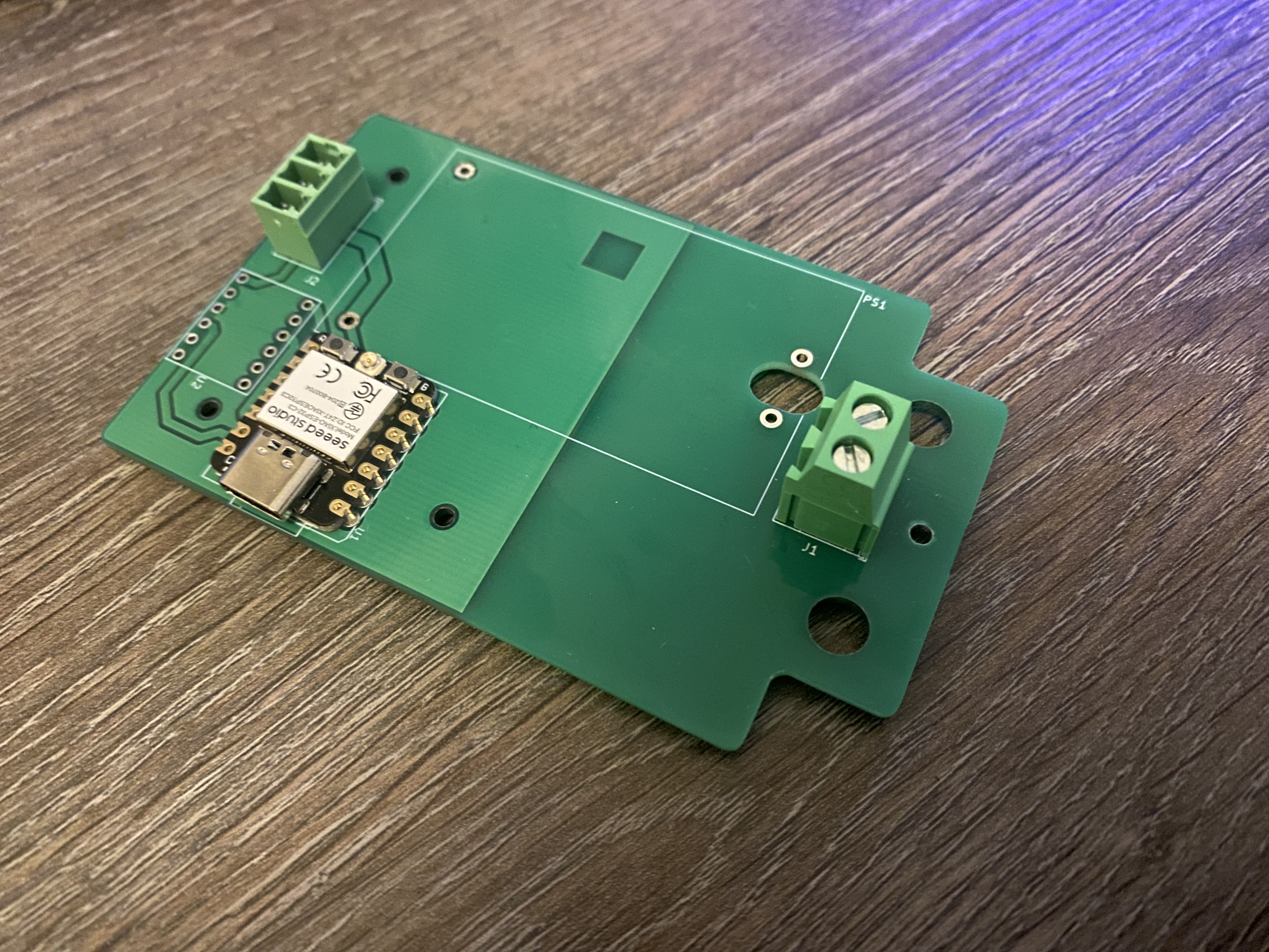 A partially assembled PCB with a XIAO ESP32-C3 already in place